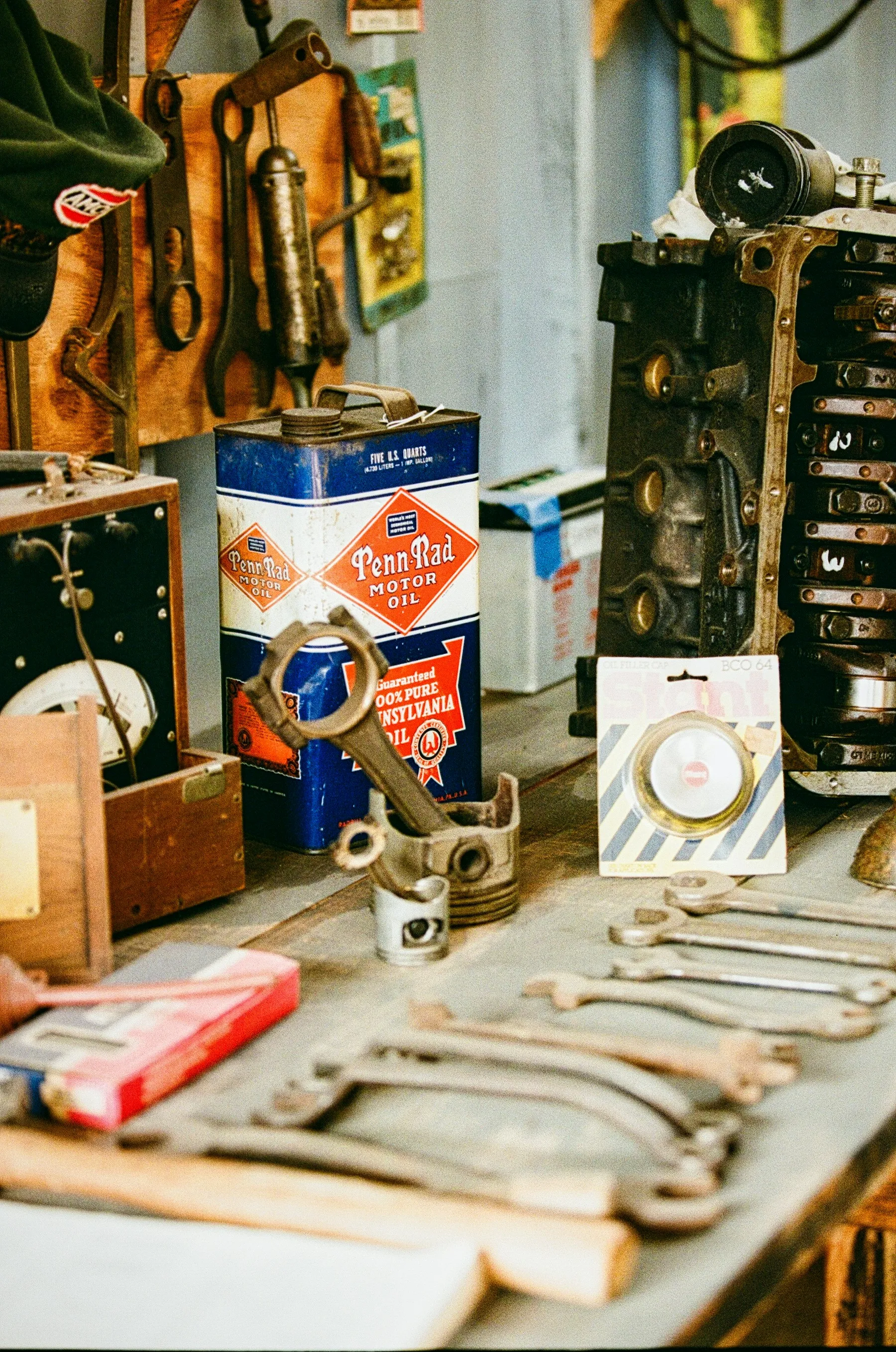 Workshop tools and parts on a bench